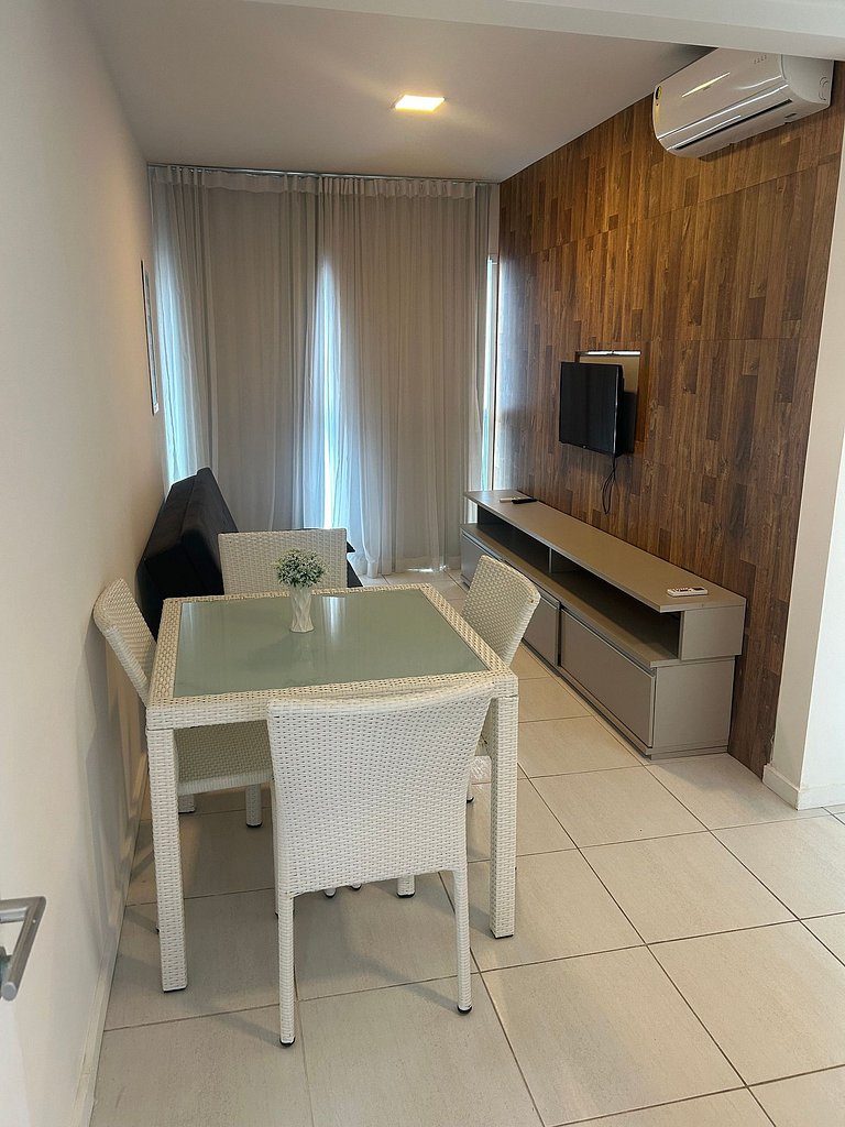 Flat 1 quarto em muro alto