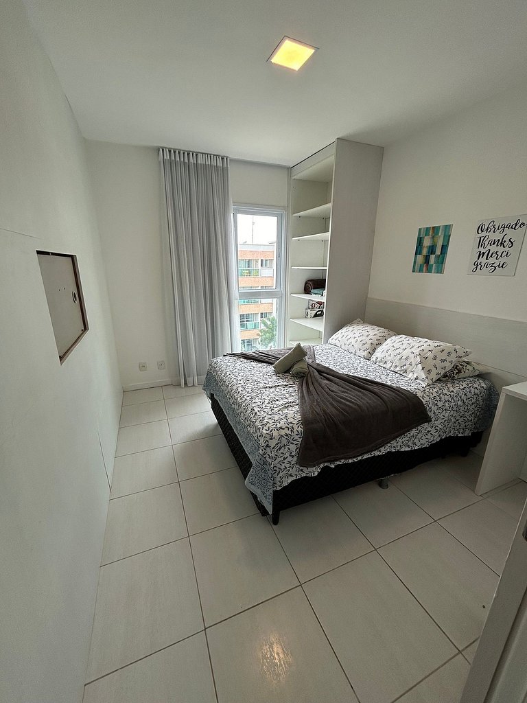 Flat 1 quarto em muro alto